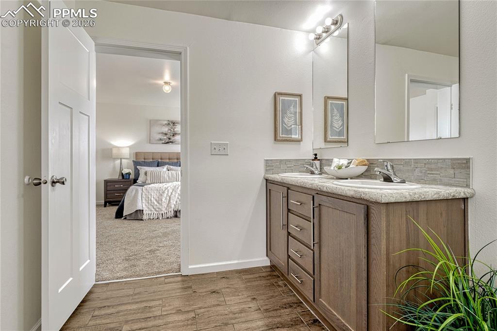 Dual vanity cabinet has large under sink storage and individual storage drawers