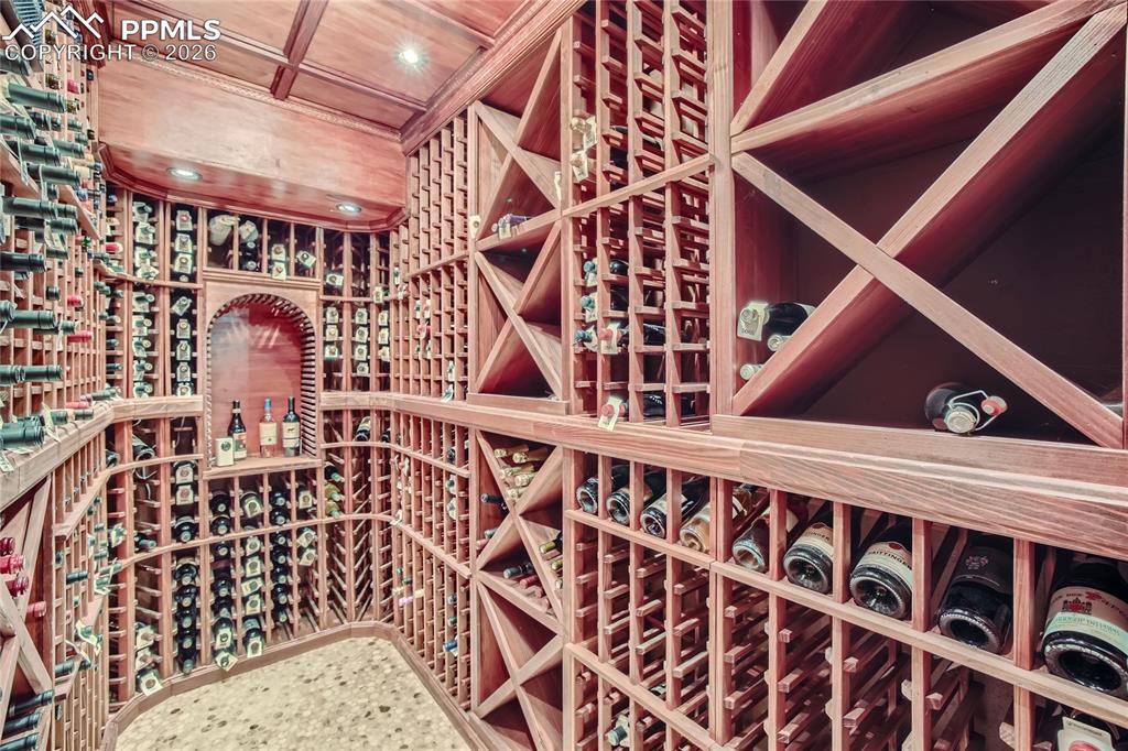 Wine room featuring wooden ceiling