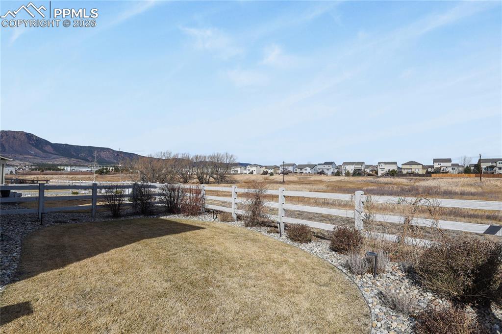 Backing to open space, the setting provides added privacy and a peaceful backdrop that’s hard to find.