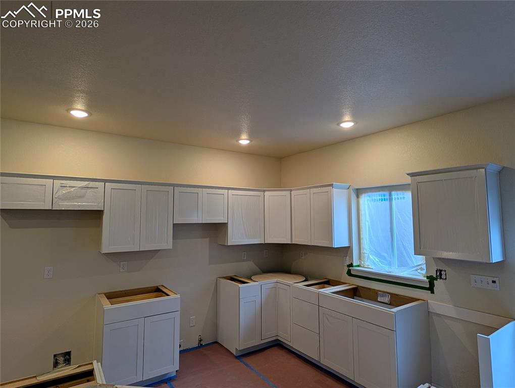 Quartz counters and stainless steel appliances will be included