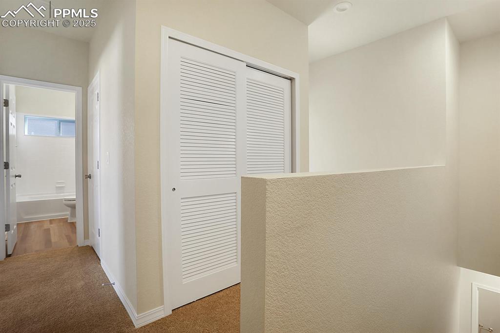 Laundry closet on upper level. Finishes will differ.