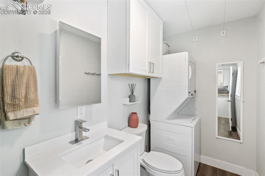1/2 Bath and laundry area off the kitchen