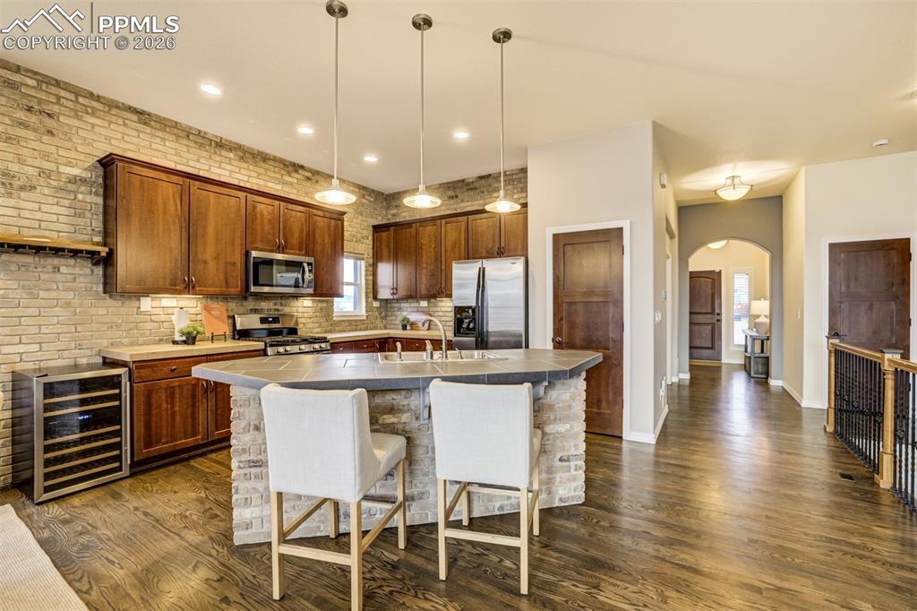 Lovely light fixtures adorn the kitchen