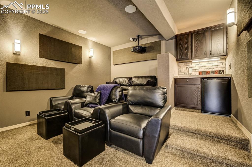 Media Room with it's own small wet bar. 