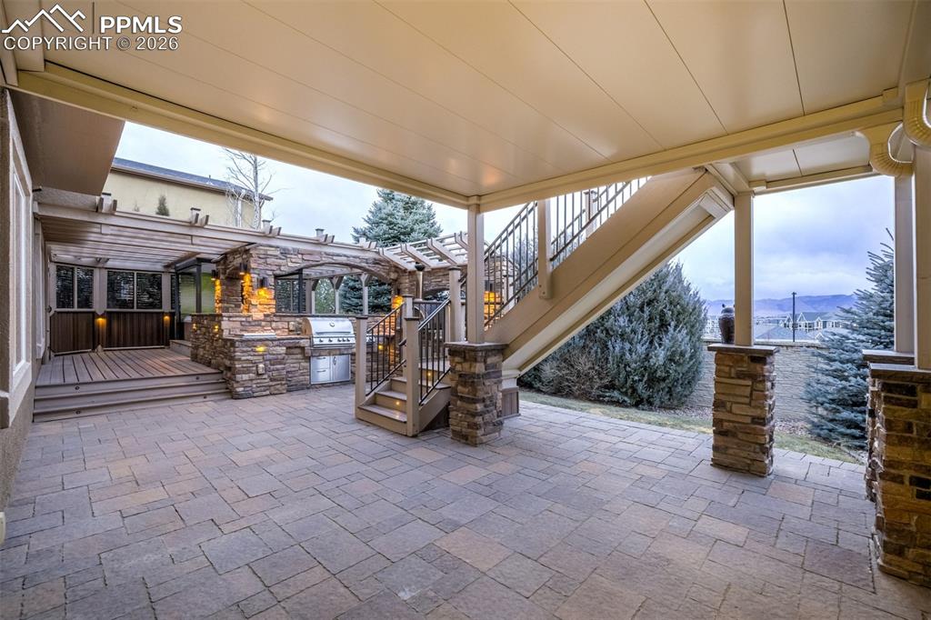 Stairs allow for easy access to the large, beautiful patio 