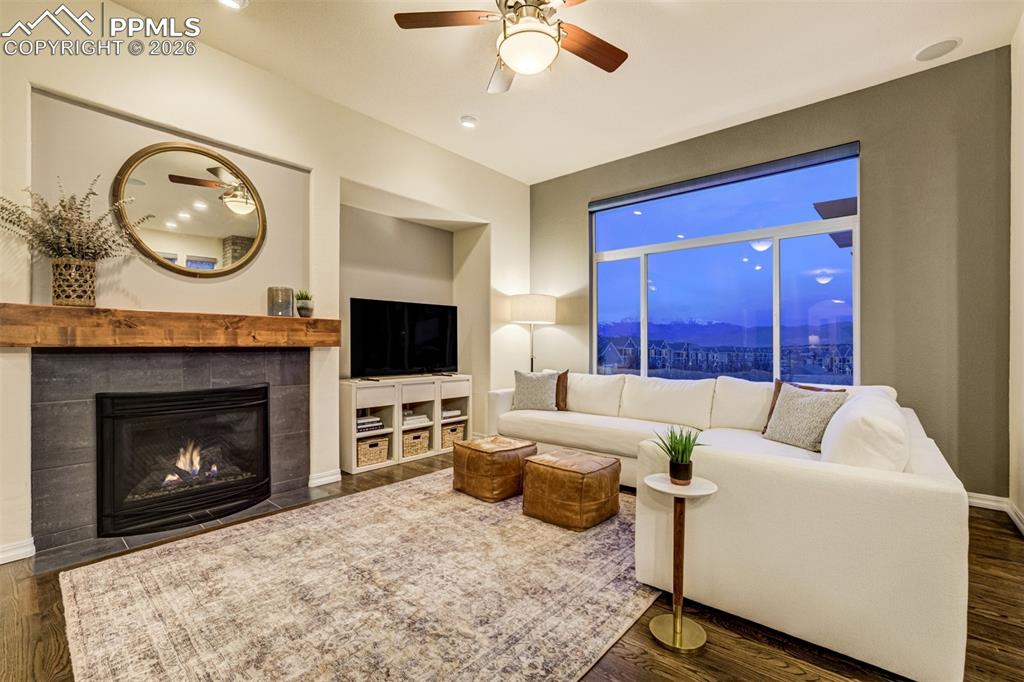 Enjoy the gorgeous evening views from the large living room windows with mountain views