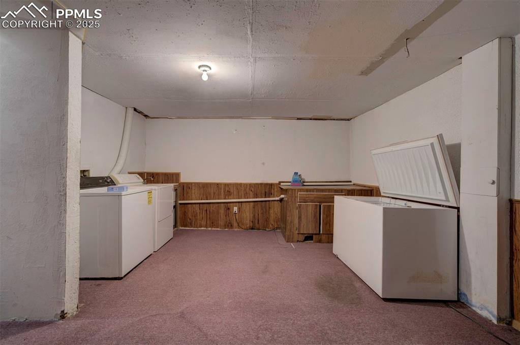 Basement flex space with washer and dryer that stays.