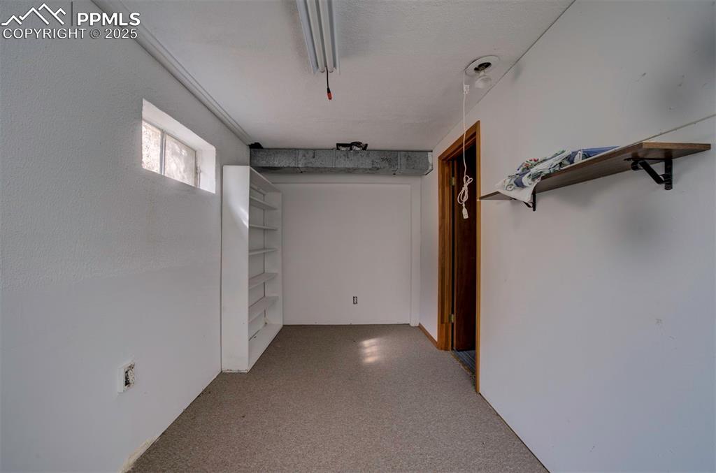 One of two basement storage rooms.