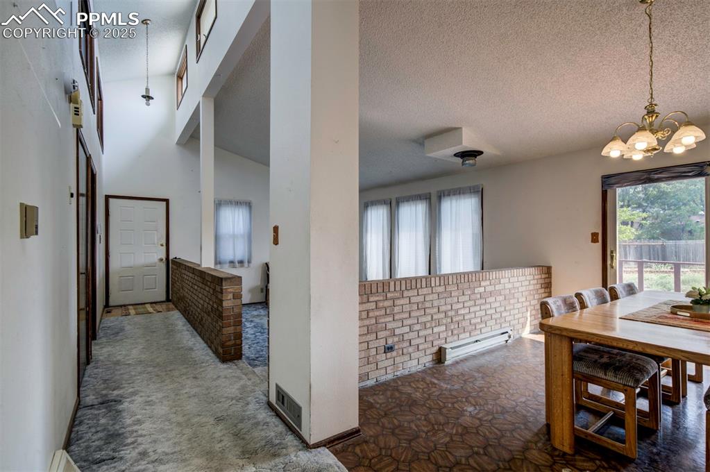 Front Entrance into Living Room and Dining Area.