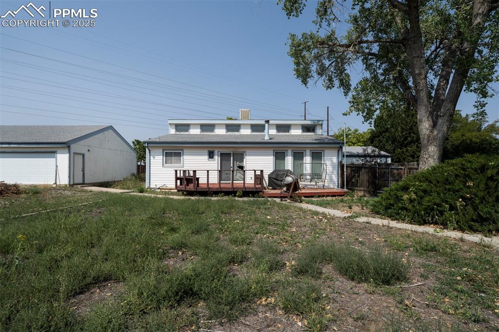 Backyard deck for outdoor dining and relaxation.