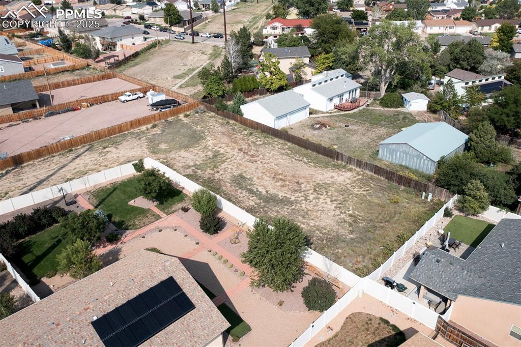 Additional vacant lot included in sale.