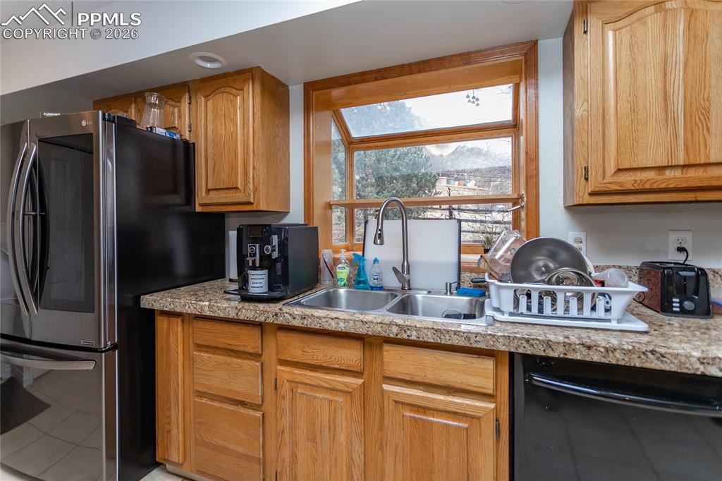 A sunny garden window in the kitchen is perfect for your indoor herb garden.
