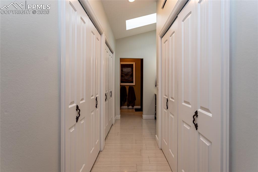 Spacious closets providing you with plenty of storage lead you into the bath area of the primary suite.