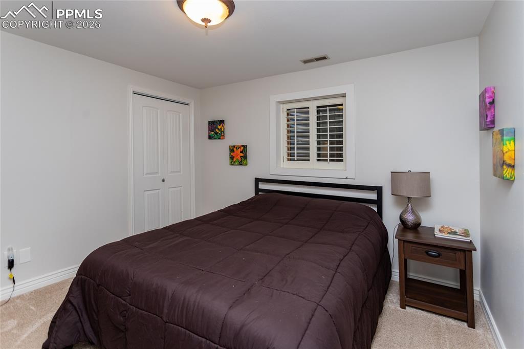 Spacious, comfortable downstairs bedroom for family or guests.