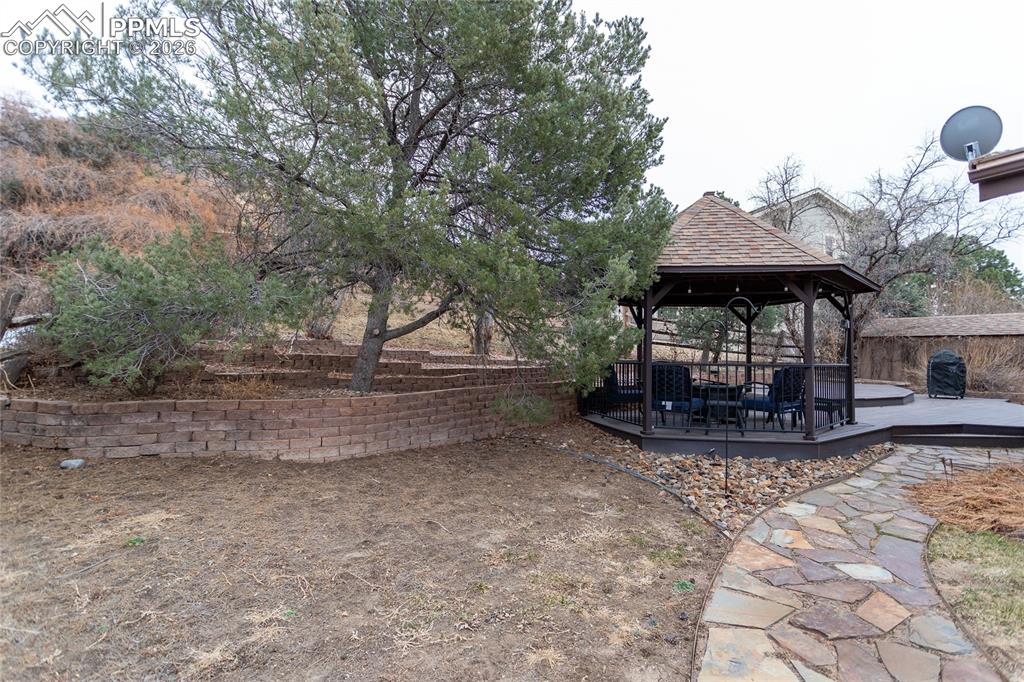 Beyond the expansive deck area you will find plenty of open yard space for gardening, playing lawn games or for the kids & the dog to run around.