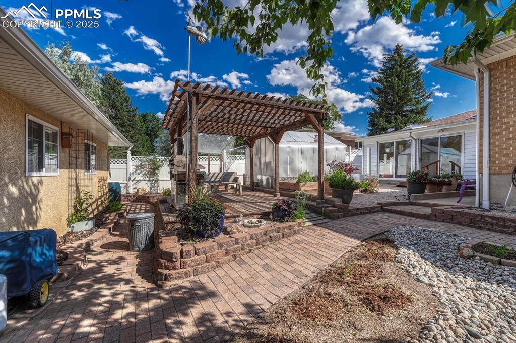 Pergola with included gas grill