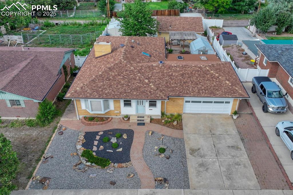 Home has attached 2 car garage plus detached 2 car garage