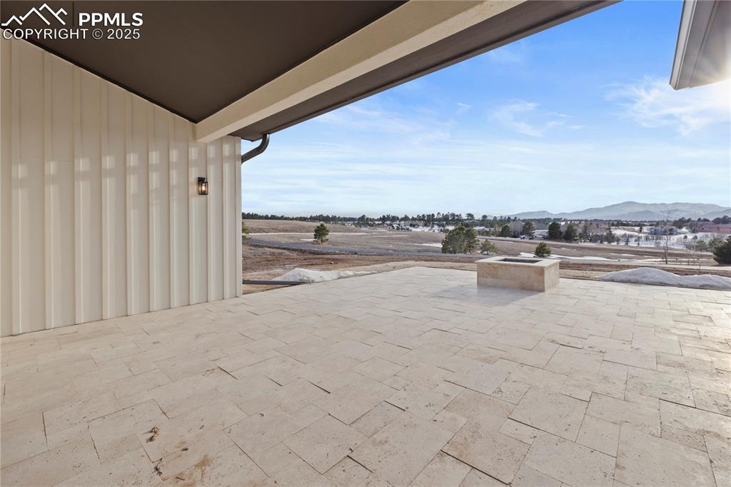 View of patio / terrace with a mountain view