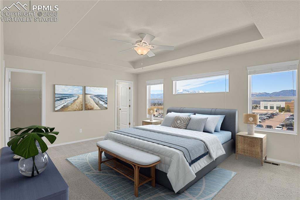 Huge primary bedroom with dual closets. Virtually Staged