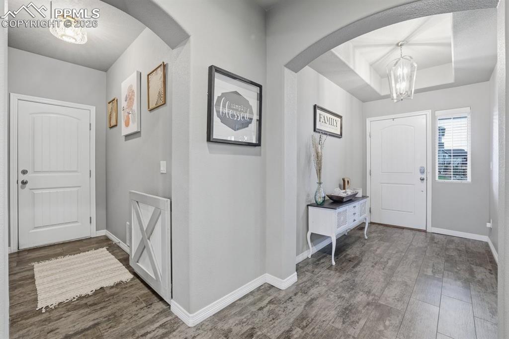 front door and garage entry mudroom area