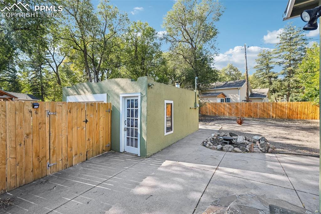 Back patio going into the detached garage