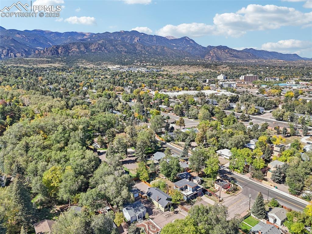 Aerial view of the home with Cheyenne mountain and pikes peak in the background!