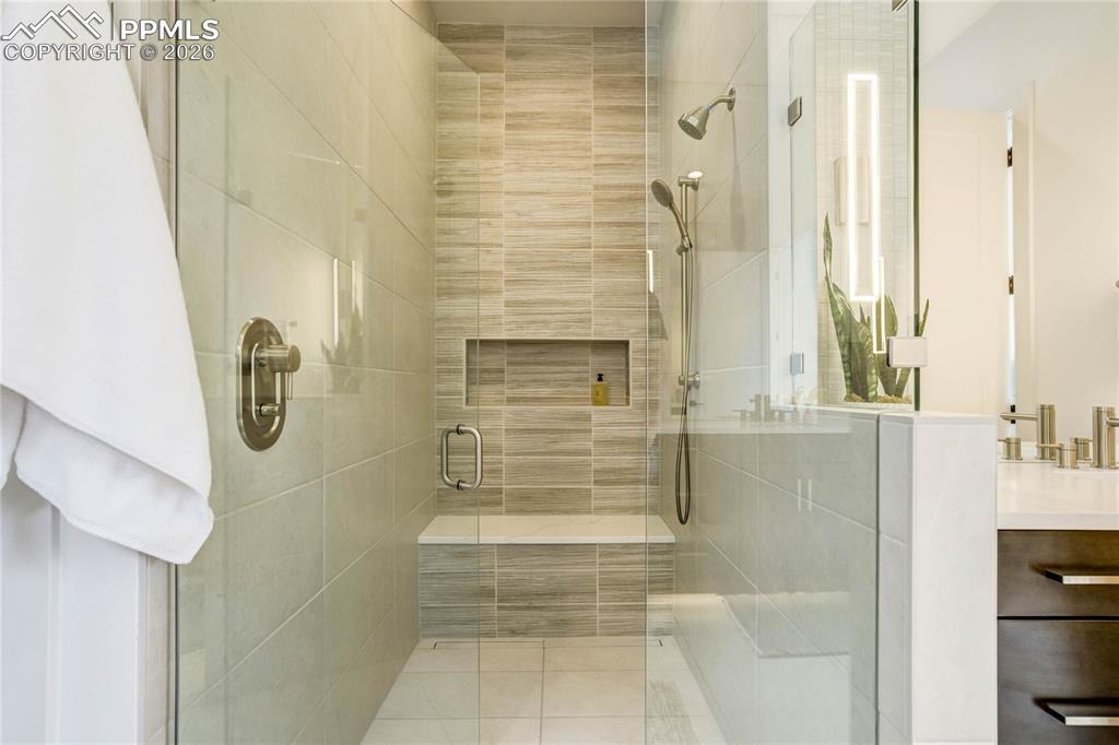 and a Barrier-Free Mud-Set Walk-in Shower w/Linear Drain, Dual Shower Heads/Sprayers + Quartz Topped Bench Seat