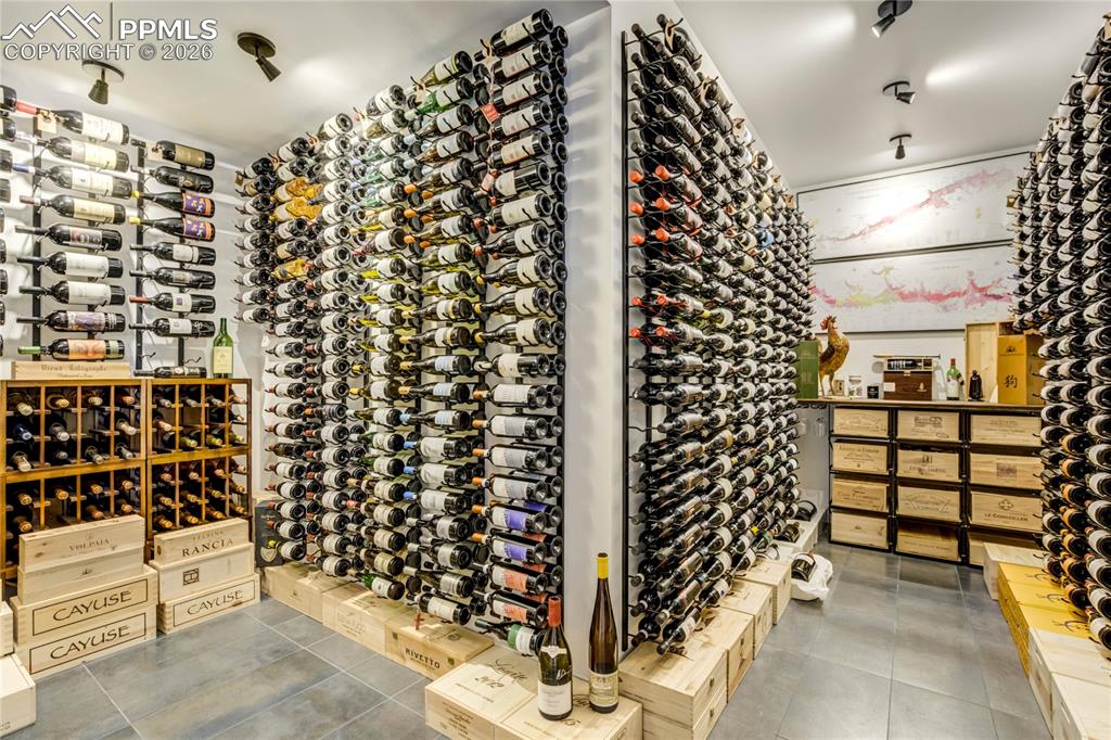 An Expansive, Temperature-Controlled Wine Cellar Thoughtfully Designed to Showcase and Preserve Your Most Treasured Collections. Dimmable Lighting Enhances Both Display and Mood, Creating an Intimate, Gallery-Like Atmosphere Ideal for Curated Evenings and Conversation.
