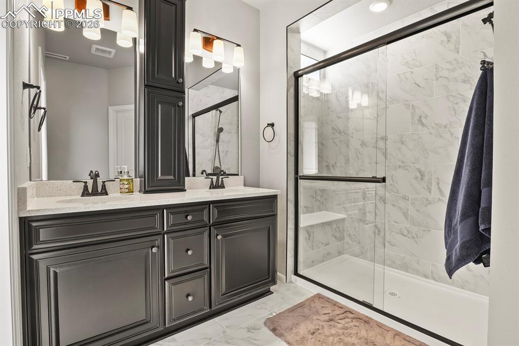 Primary bath with oversize walk in shower.