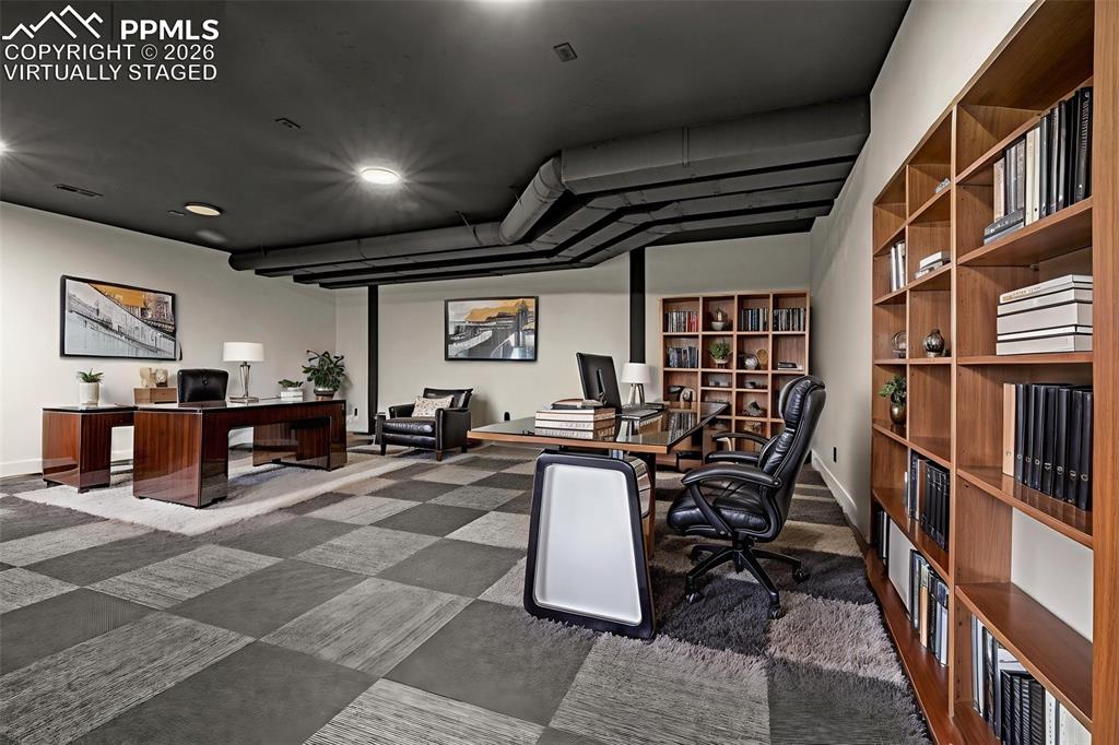 Virtually staged as office, designed to be theatre. Lower level