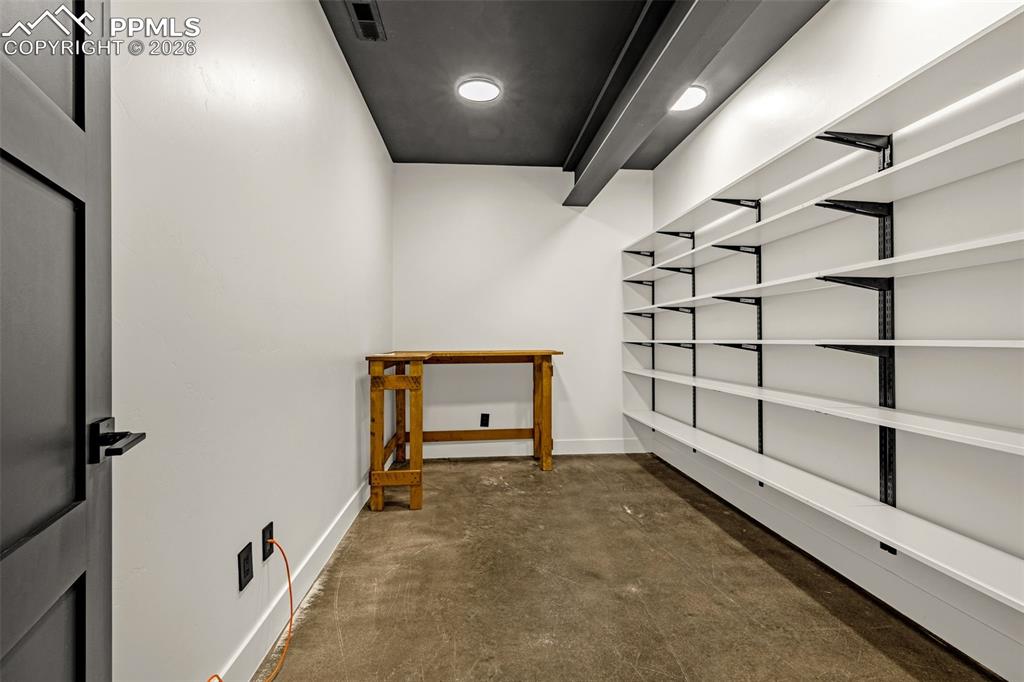 Bedroom 1 walk-in closet. Lower level.