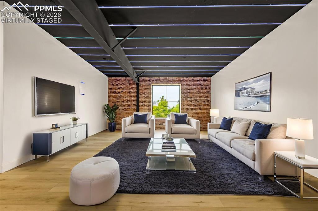 Virtually staged. Open loft, entertainment media lounge or exercise area. Upper Level.