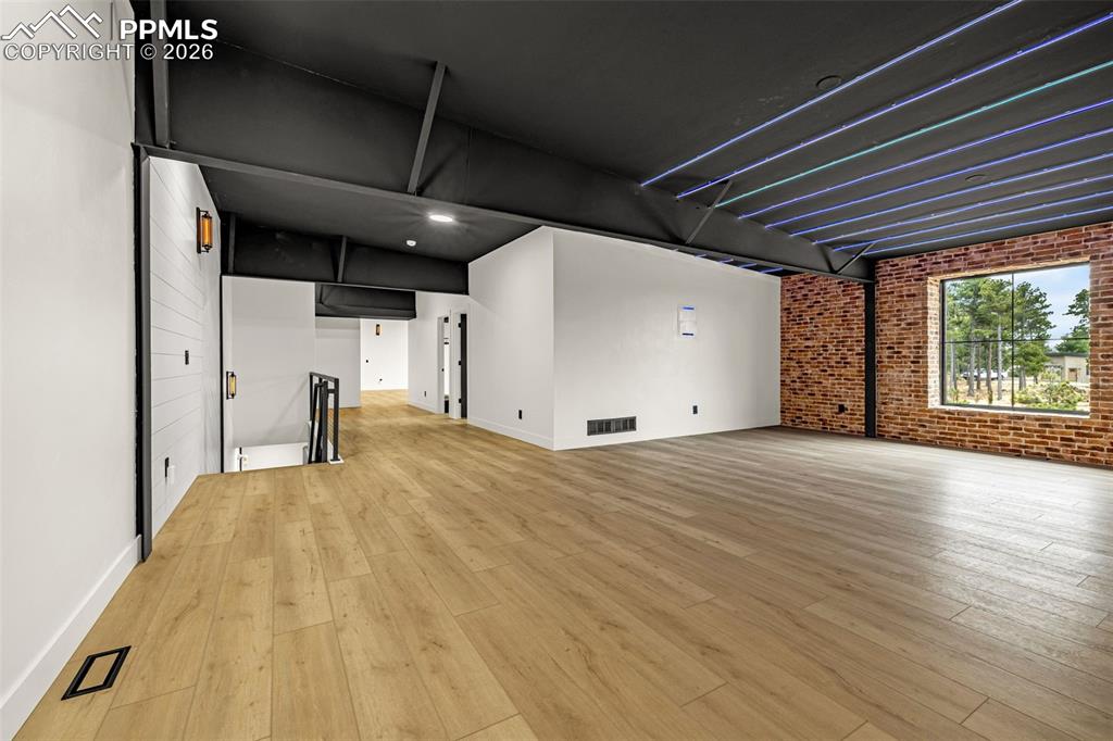 Open loft, entertainment, media lounge or exercise area. Upper level.