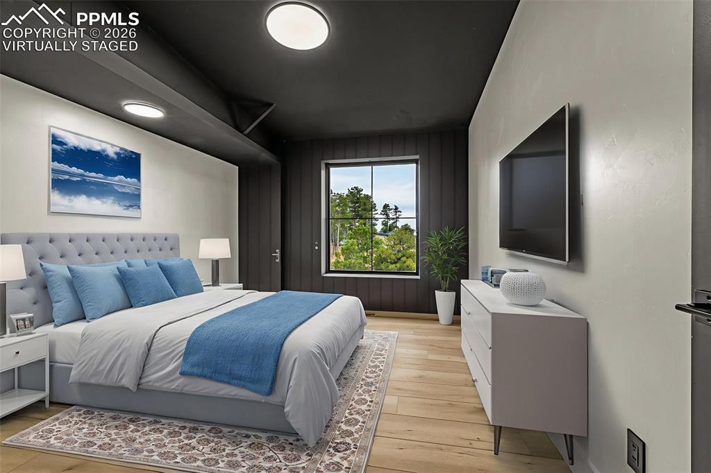 Virtually staged - Bedroom 5, upper level.