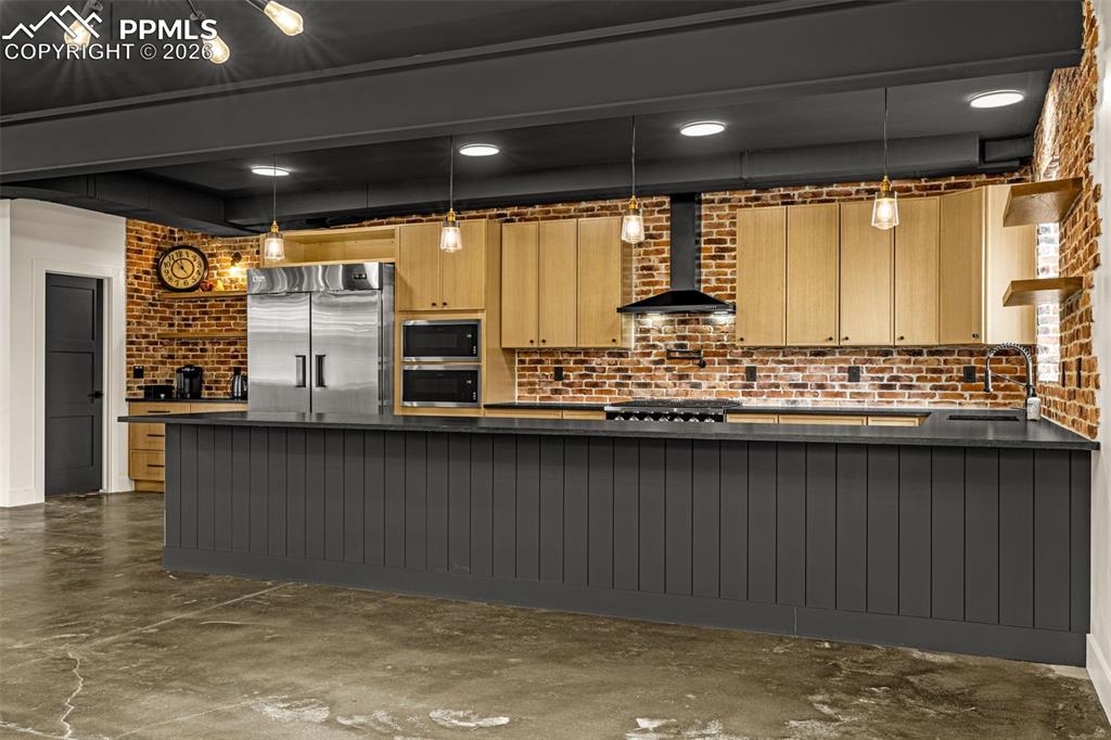 Kitchen with walk-in pantry.