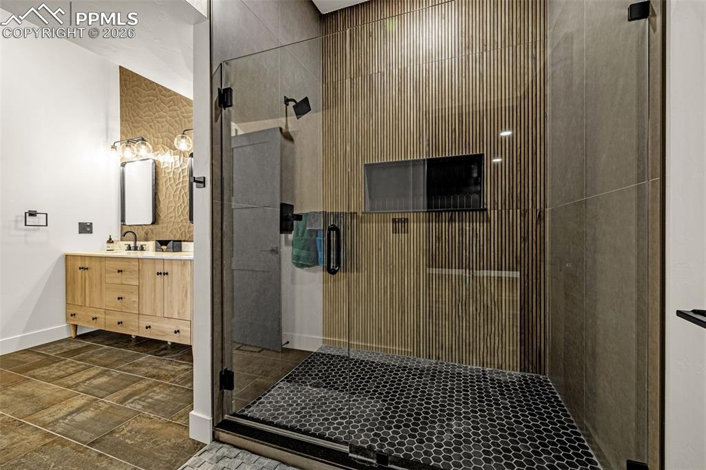 Primary bathroom shower. Upper level.