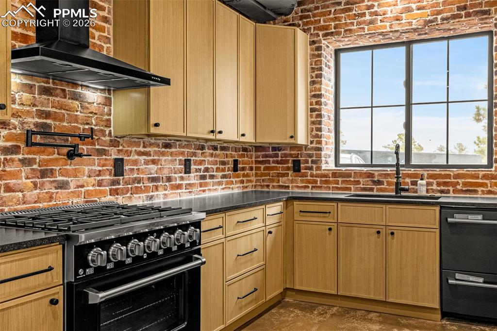 Kitchen with two (2) dishwashers and garbage disposal.