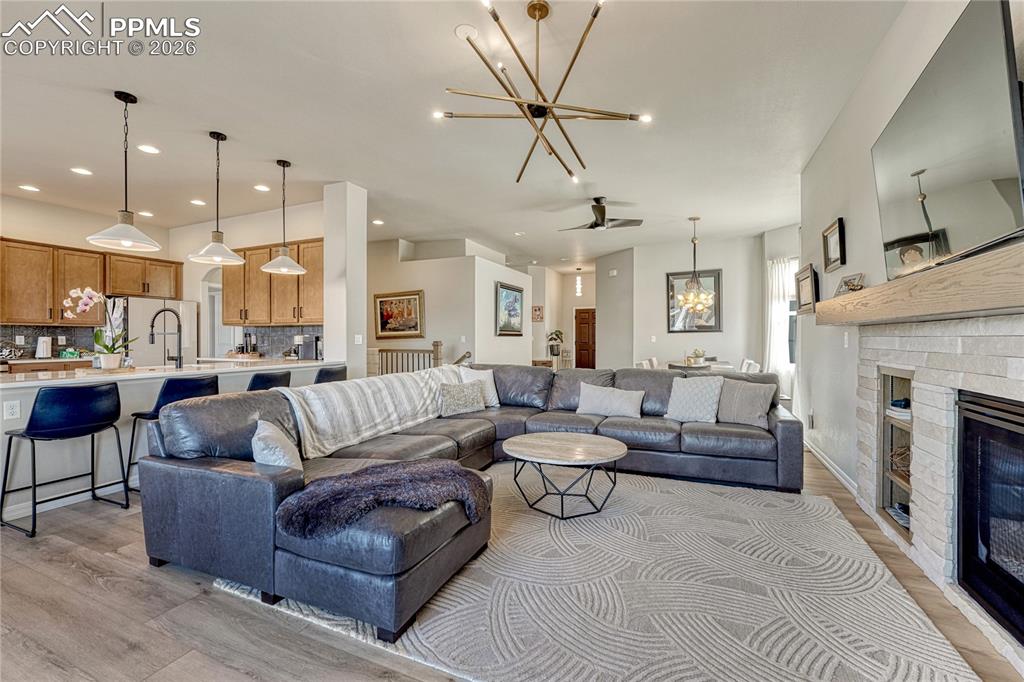 Open floor plan with designer lighting throughout