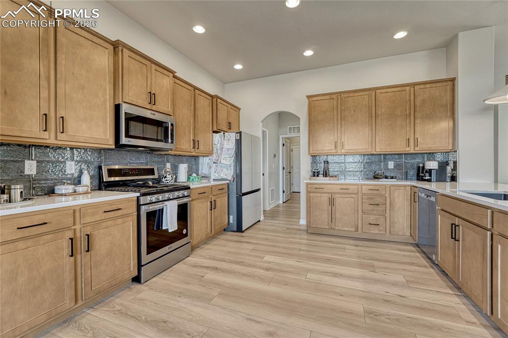 Extra large kitchen, so much storage and designer tile backsplash