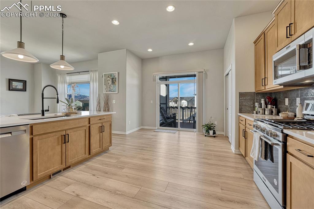 View of walkout to patio from kitchen