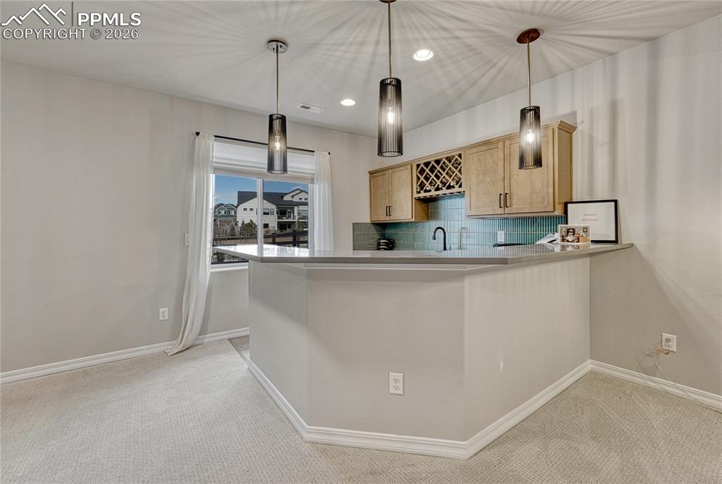Wet bar/mini kitchen in basement