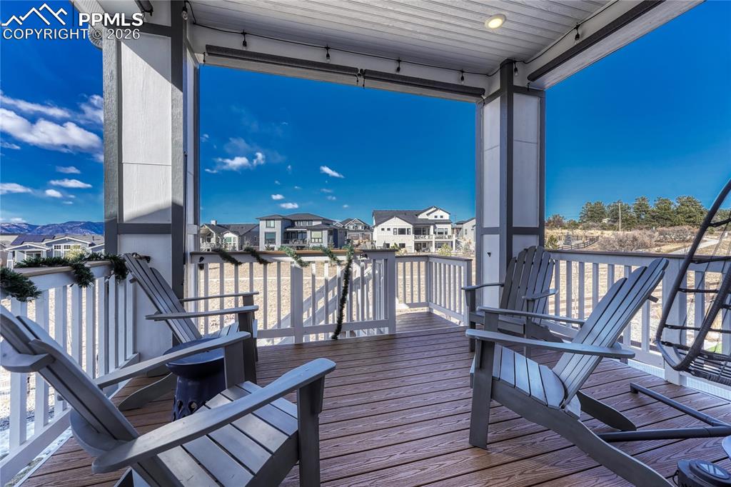 Covered patio off of the kitchen with mountain views