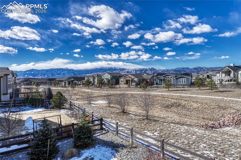 Unobstructed Mountain views can be seen from living room, patio, lower level family and backyard.