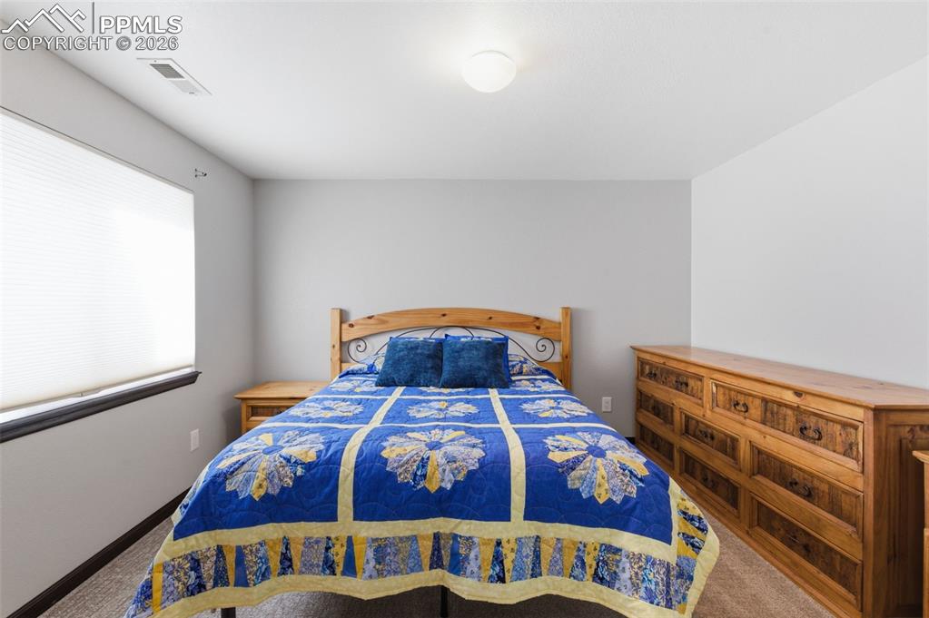 Lower level bedroom is light and bright.