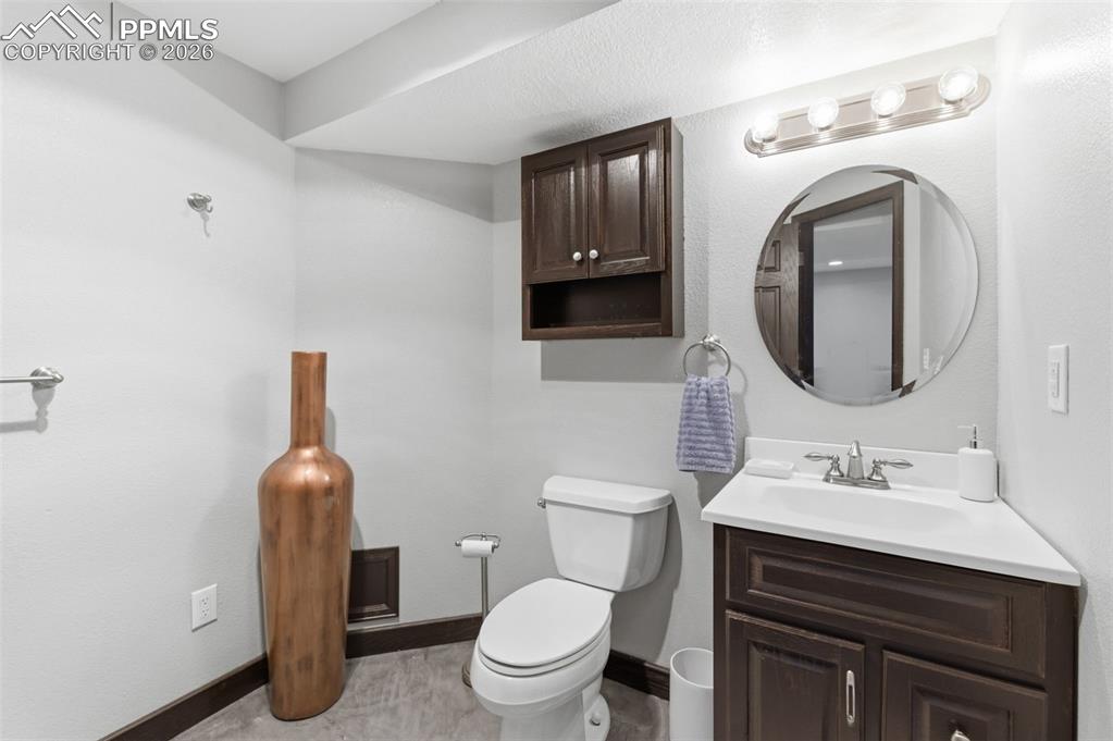 The basement level full bath is spacious and warm