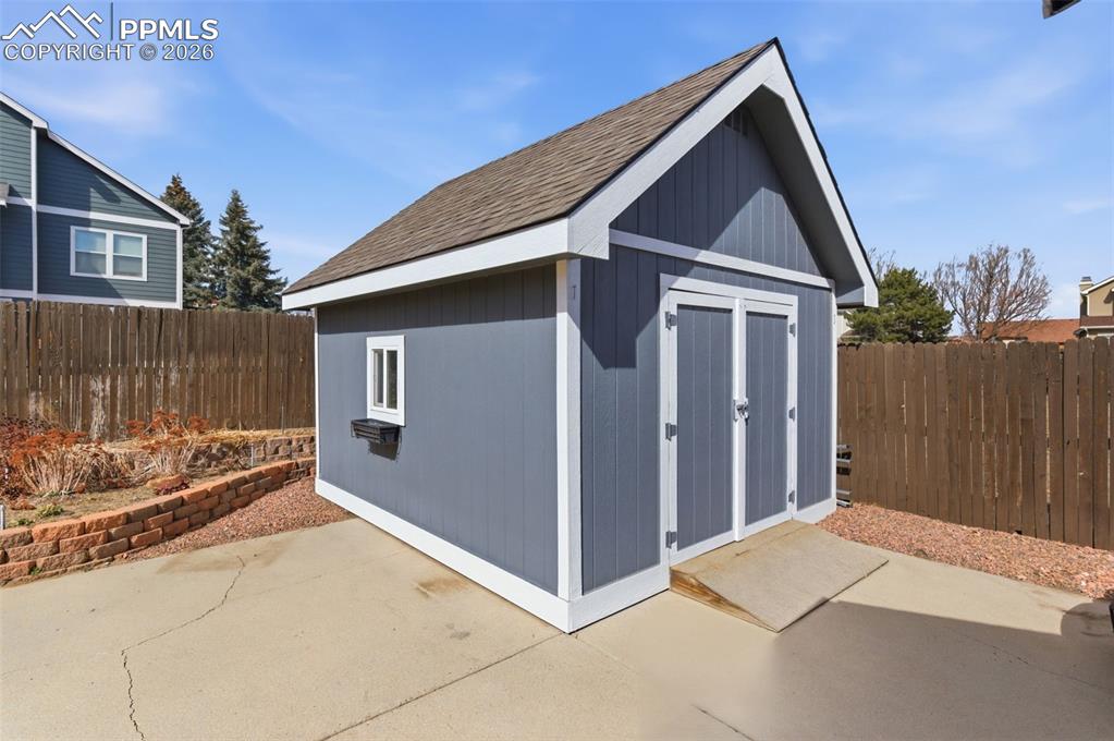 This coordinated storage in the back is great for yard tools, lawn mower, and general storage.