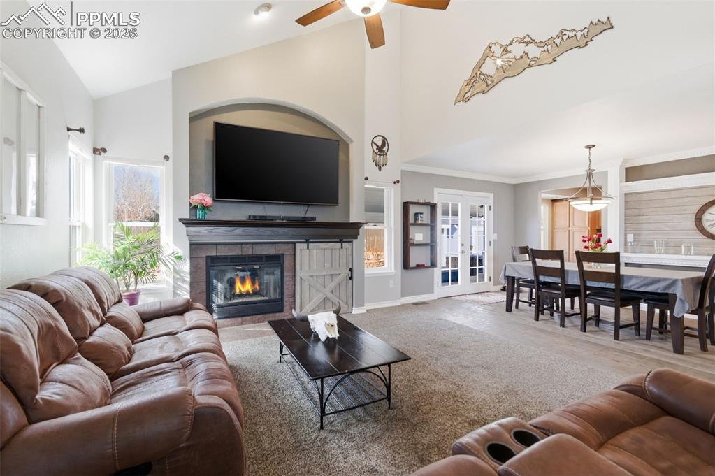 Open, warm, and comfortable describes this beautiful and open living space