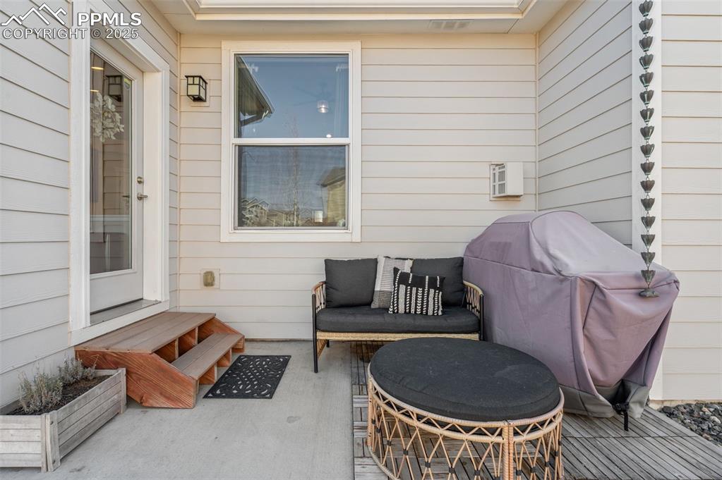 View of patio featuring grilling area and outdoor lounge area
