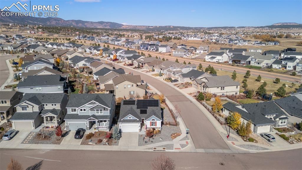 Aerial perspective of suburban area featuring mountains