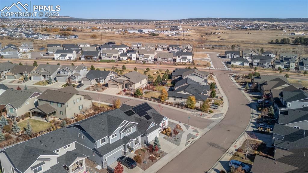 View of property location with nearby suburban area